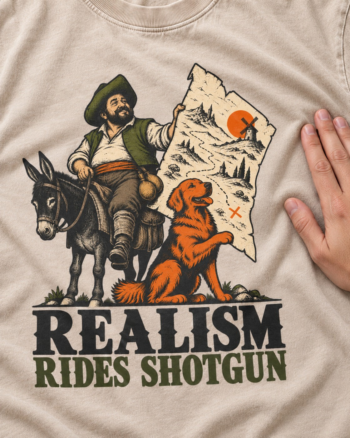 Realism Rides Shotgun with Golden Retriever Washed Tee in Apricot, close-up of the graphic