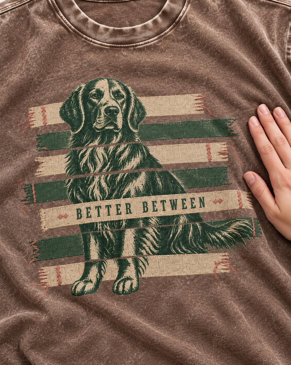 Golden Retriever Better Between Washed Tee in Coffee, close-up of the graphic