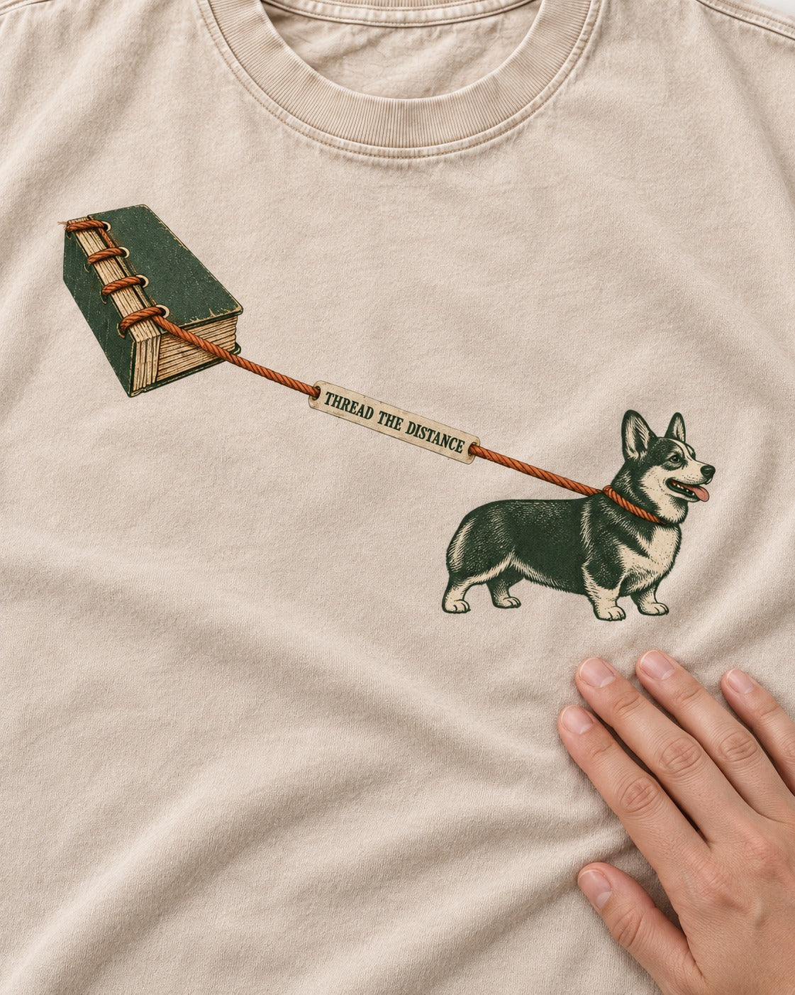 Thread the Distance with Corgi Washed Tee in Apricot, close-up of the graphic