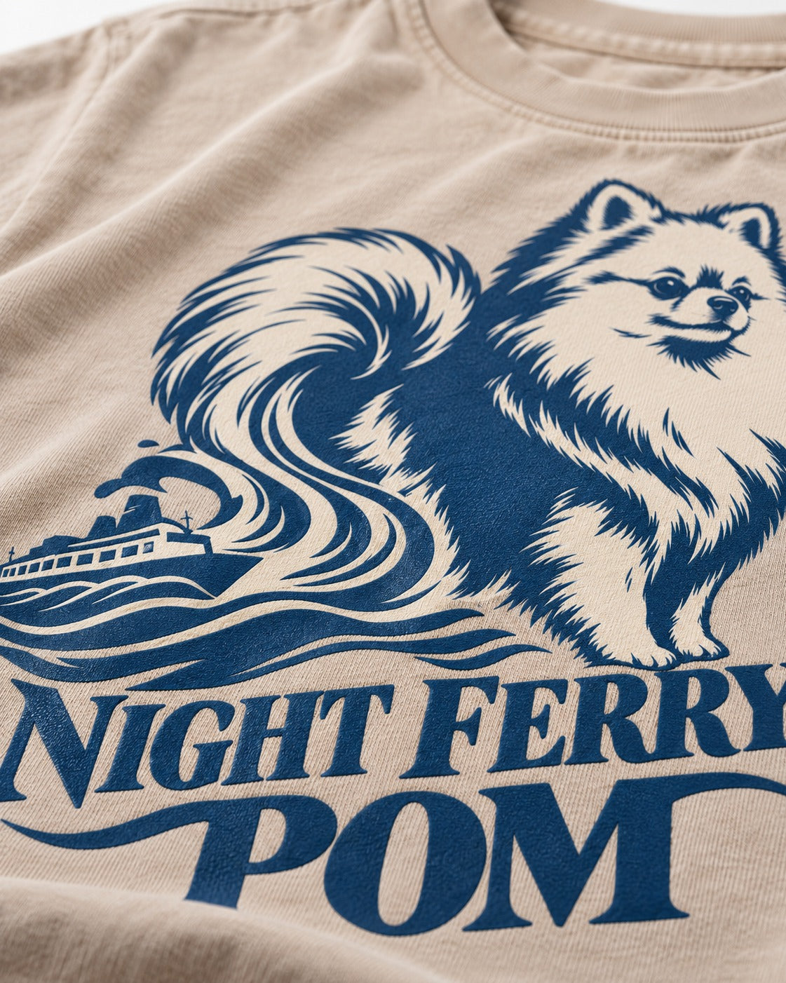 Night Ferry Pomeranian Washed Tee in Apricot, close-up of the graphic