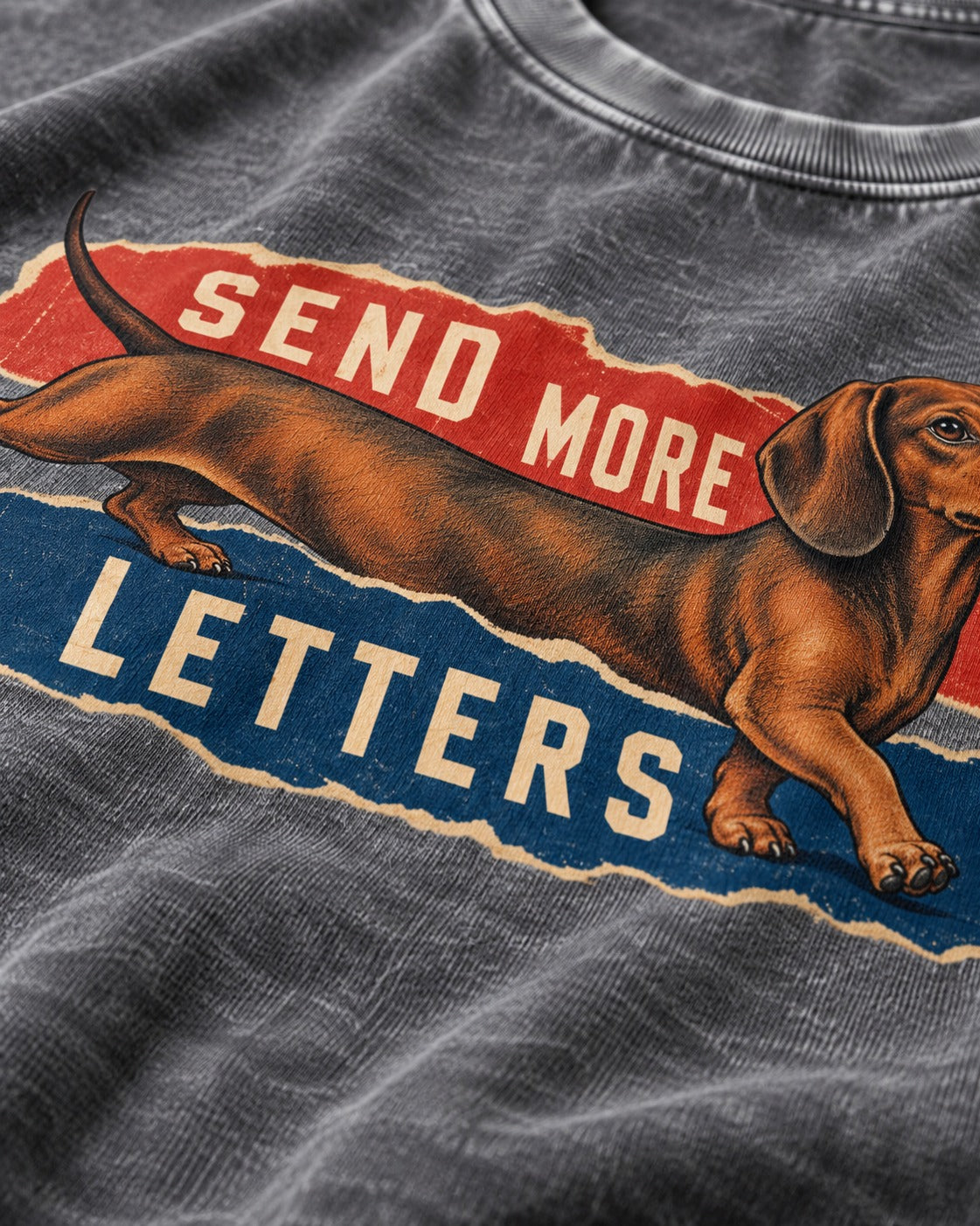 Dachshund Send More Letters Torn Paper Graphic Washed Tee in Gray, close-up of the graphic