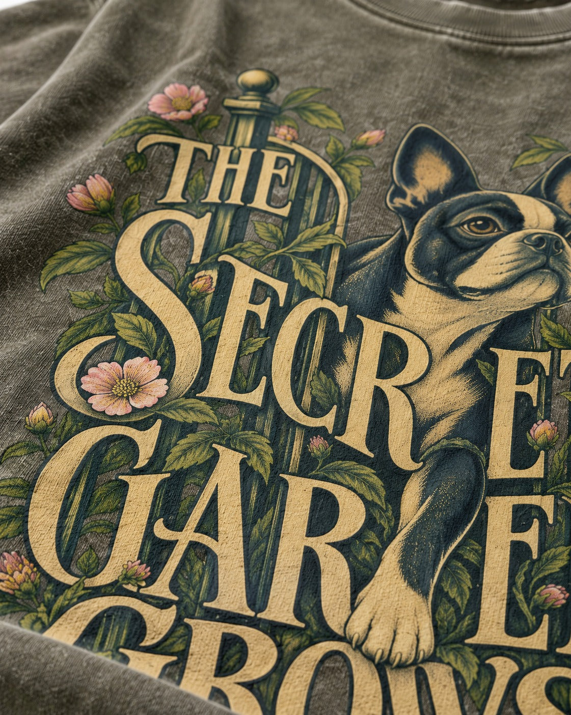 The Secret Garden Grows Boston Terrier Washed Tee in Army Green, close-up of the graphic