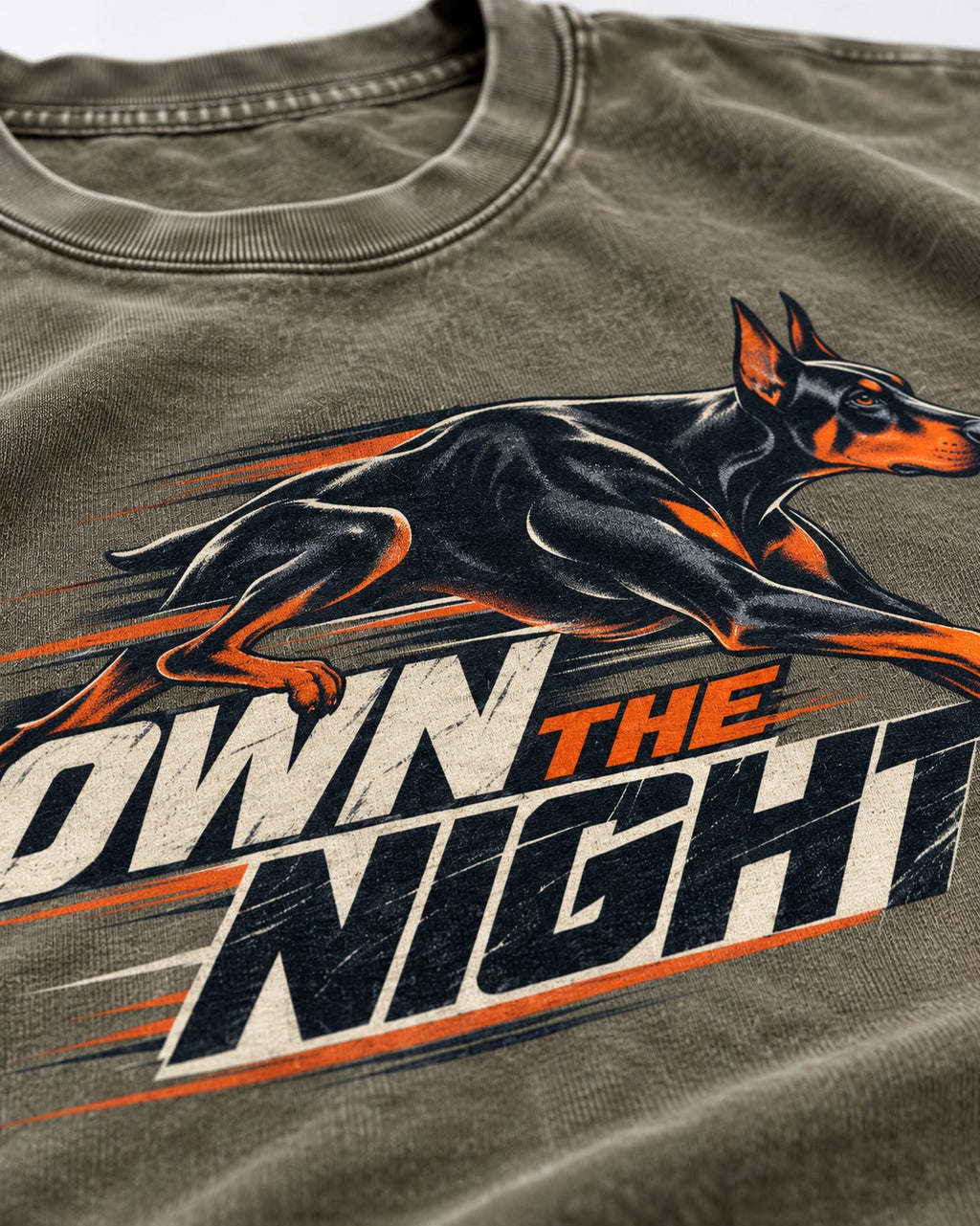 Doberman Own the Night Speed Graphic Washed Tee in Army Green, close-up of the graphic