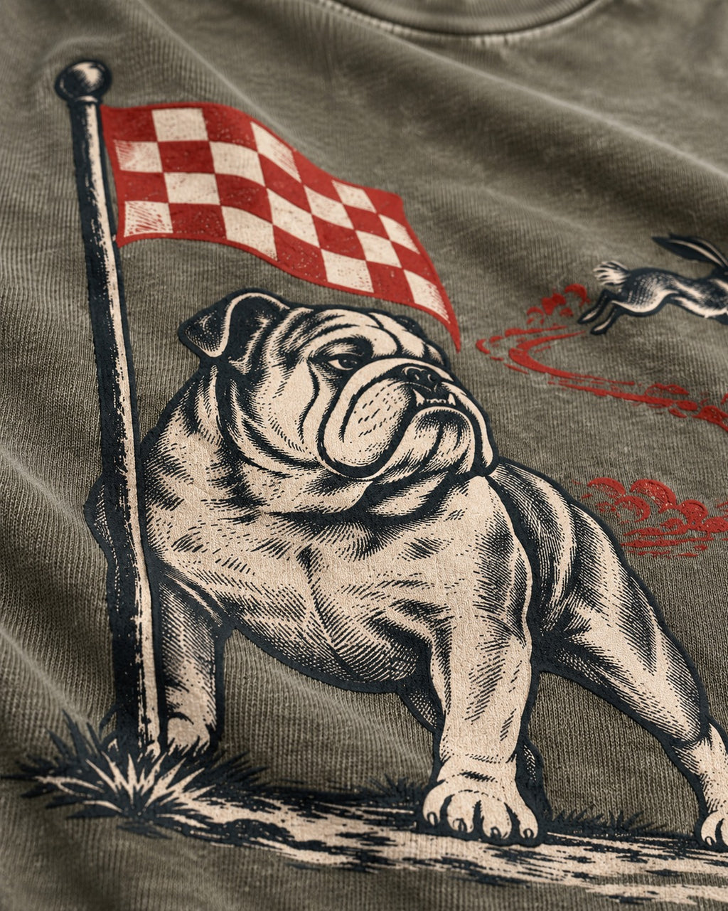 English Bulldog Checkered Flag Rabbit Chase Washed Tee in Army Green, close-up of the graphic