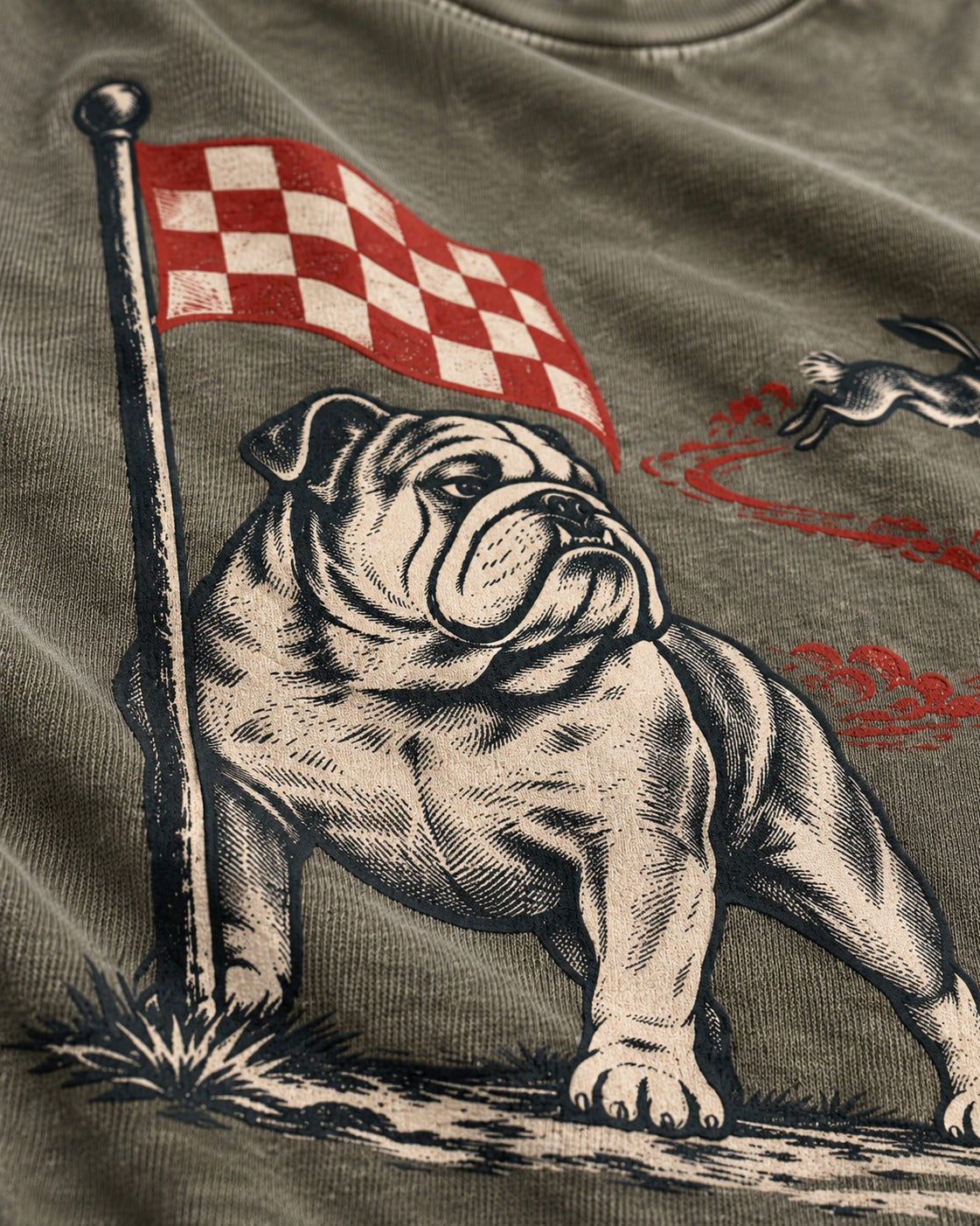 English Bulldog Checkered Flag Rabbit Chase Washed Tee in Army Green, close-up of the graphic