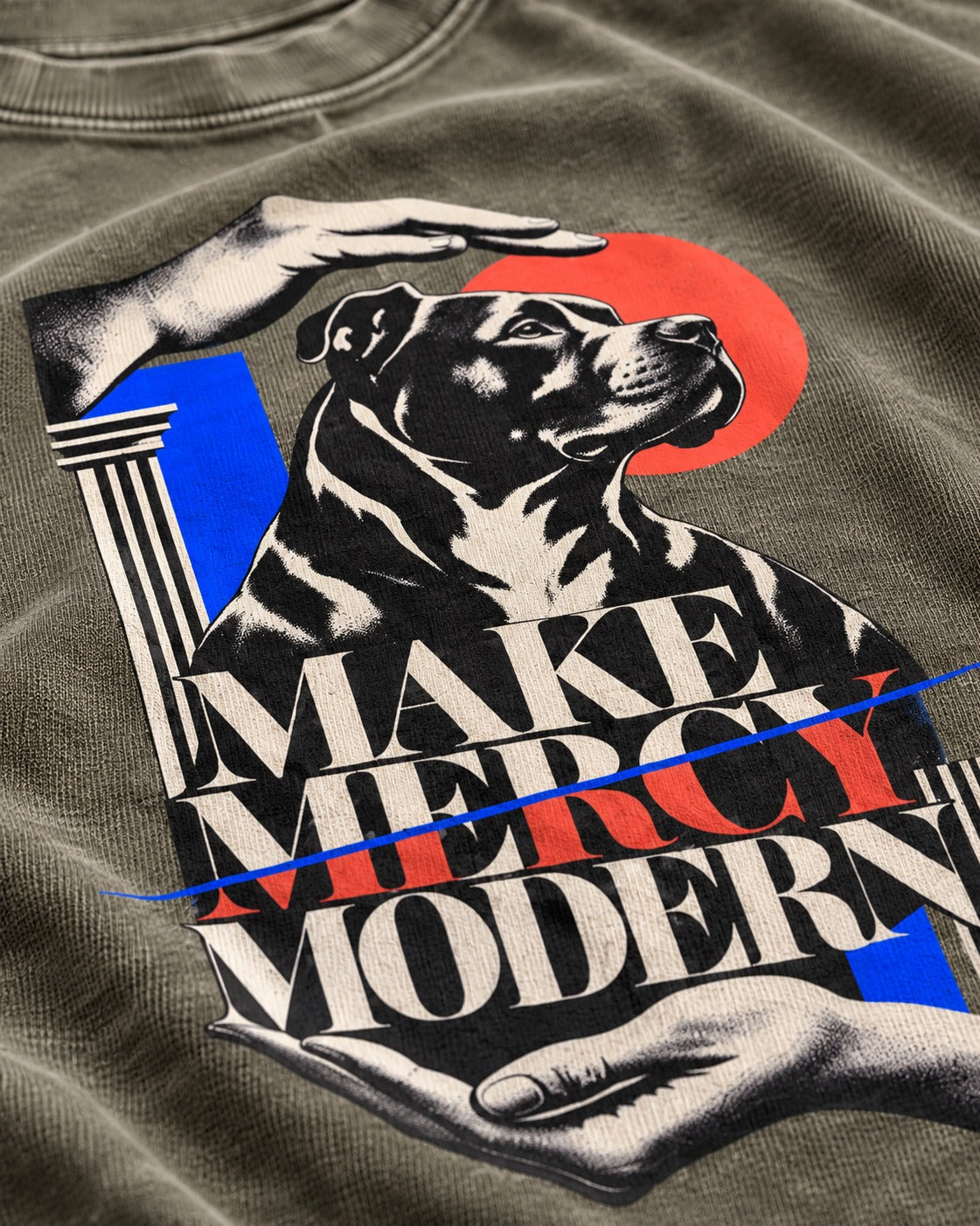 Pitbull Make Mercy Modern Protective Hands Graphic Washed Tee in Army Green, close-up of the graphic