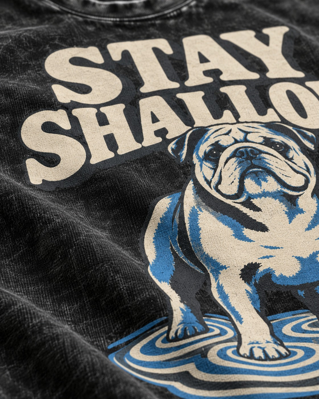 English Bulldog Stay Shallow Ripple Graphic Washed Tee in Black, close-up of the graphic