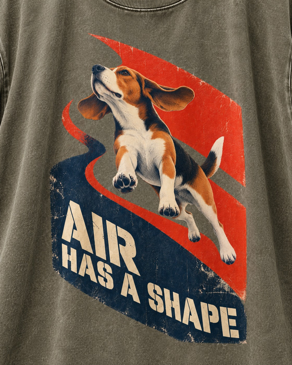 Air Has A Shape Beagle Jumping Graphic Washed Tee in Army Green, close-up of the graphic