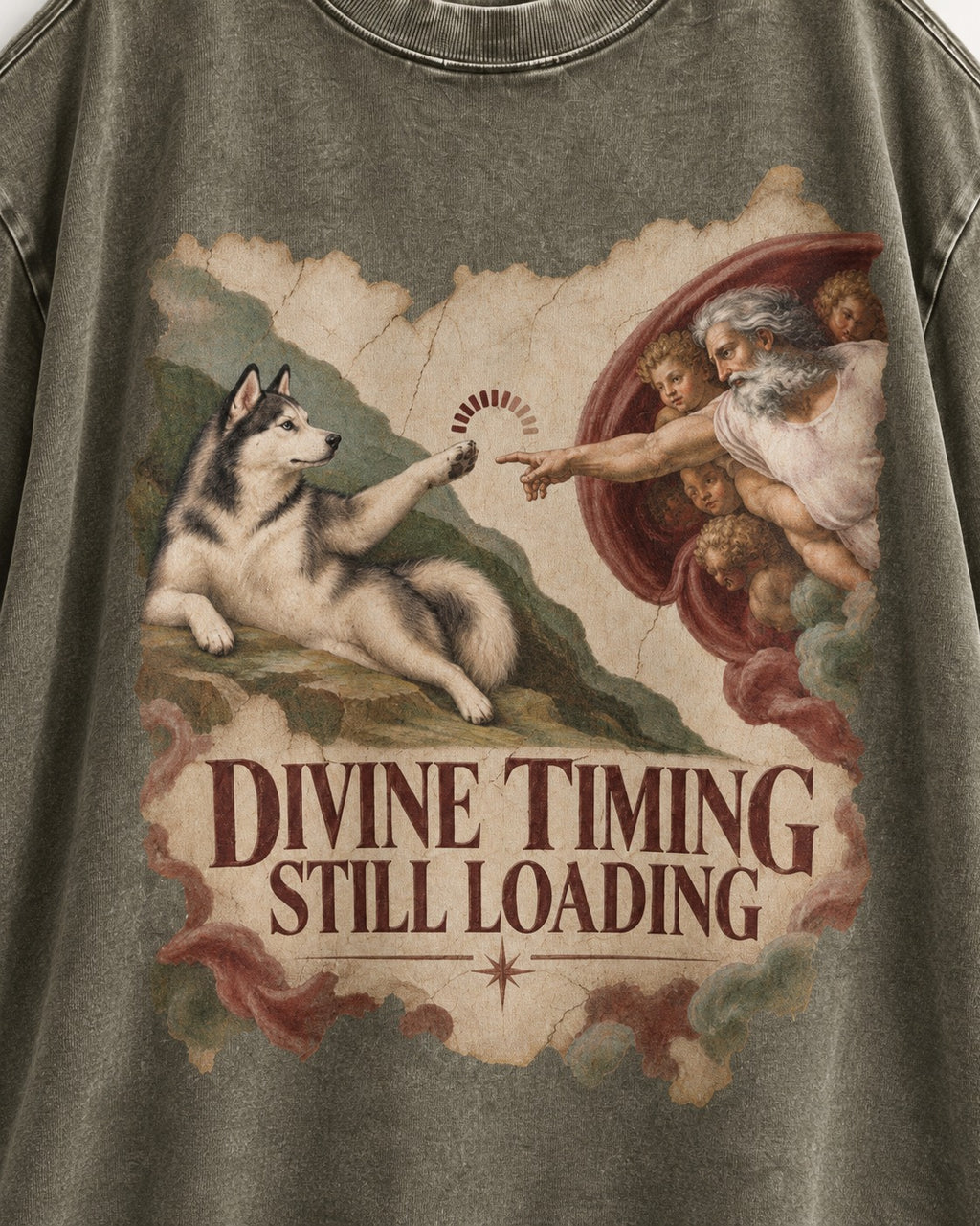 Husky Divine Timing Still Loading Creation Parody Graphic Washed Tee in Army Green, close-up of the graphic