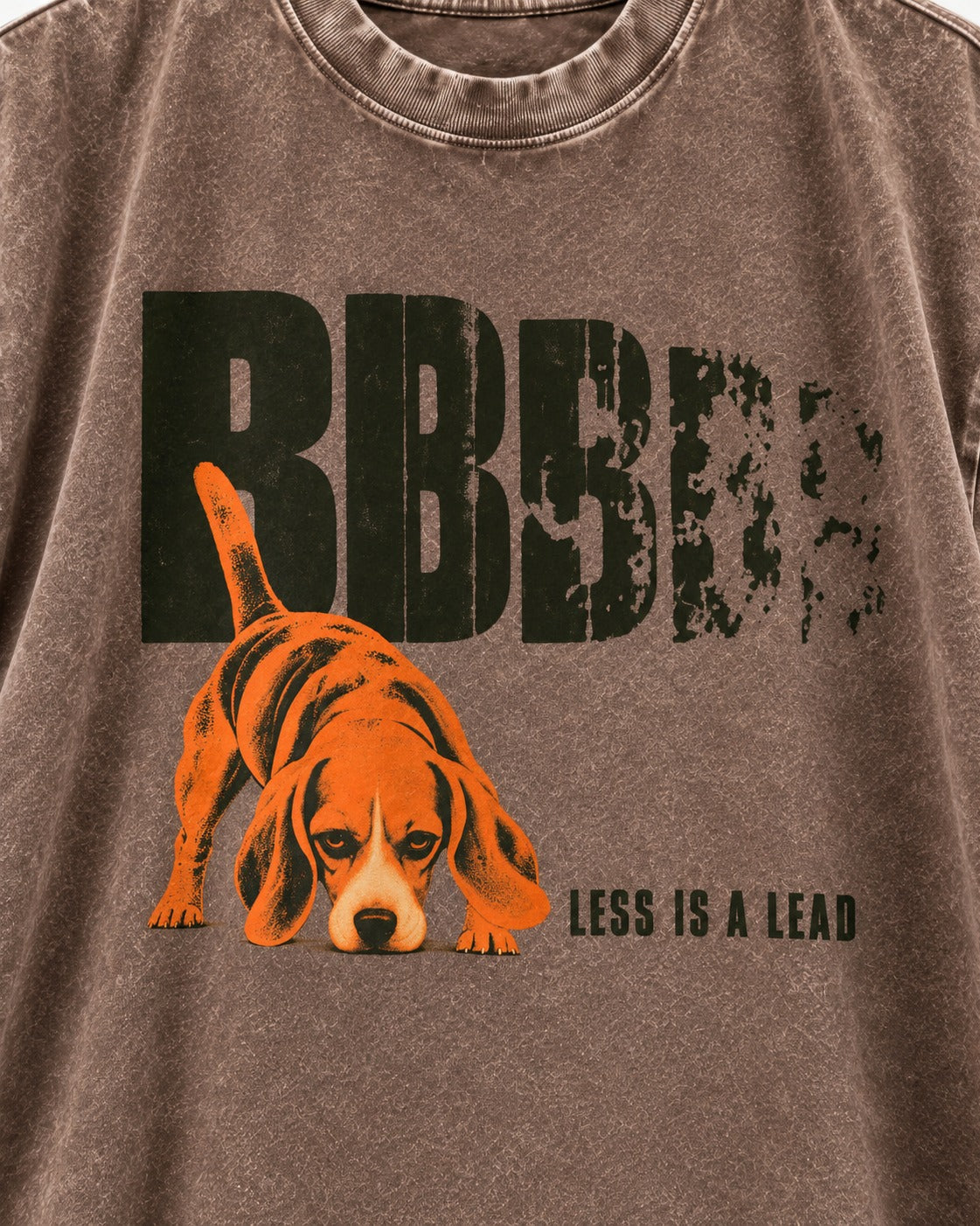 Less Is a Lead Beagle Washed Tee in Coffee, close-up of the graphic