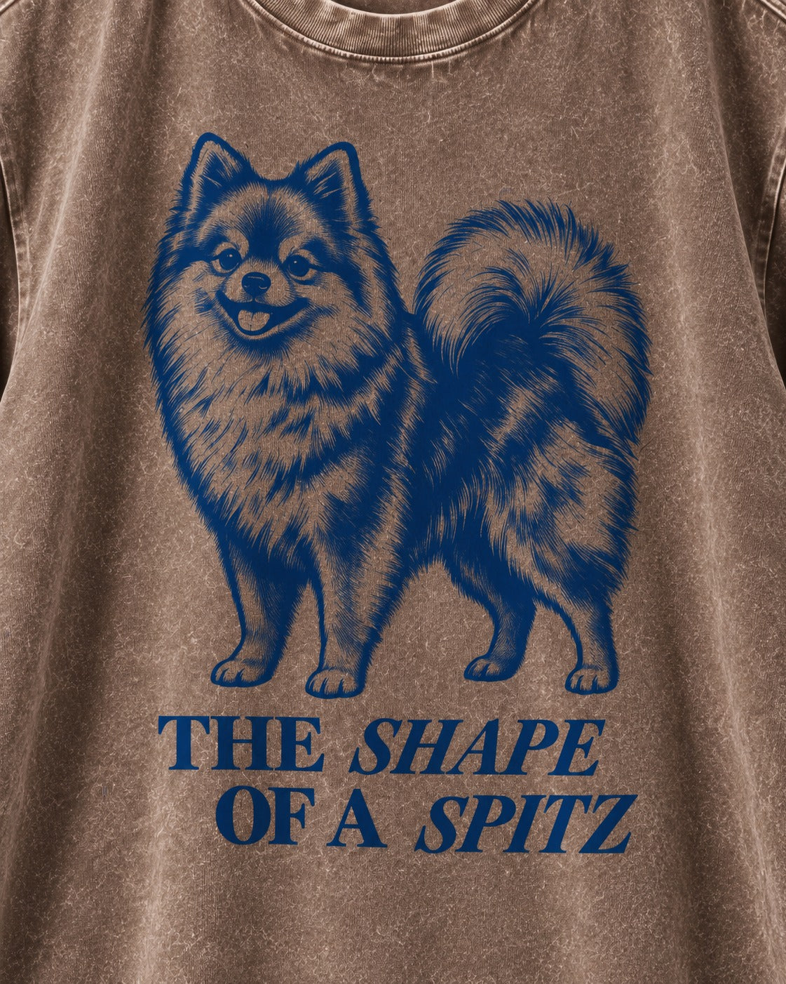 The Shape of a Pomeranian Washed Tee in Coffee, close-up of the graphic