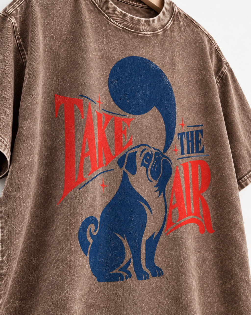 Pug Take the Air Washed Tee in Coffee, close-up of the graphic