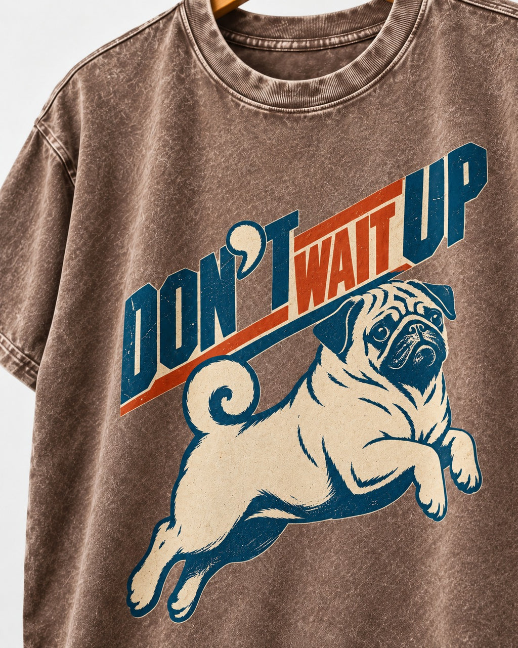Don't Wait Up for Pug Washed Tee in Coffee, close-up of the graphic