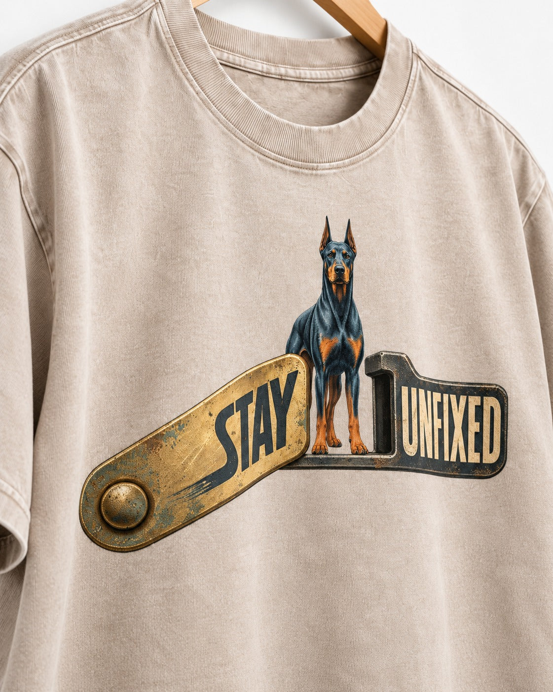 Doberman Stay Unfixed Washed Tee in Apricot, close-up of the graphic