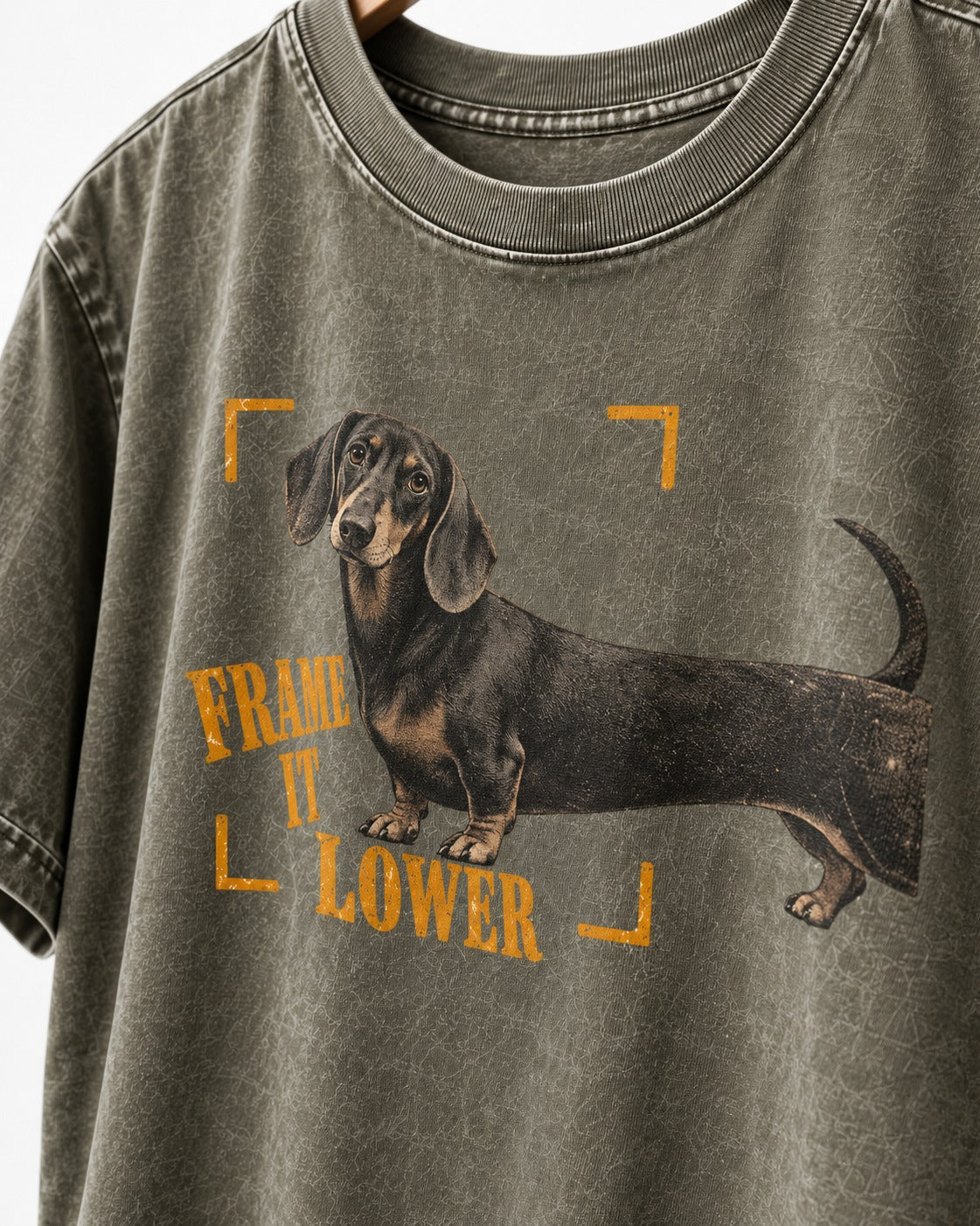 Dachshund Frame It Lower Viewfinder Graphic Washed Tee in Army Green, close-up of the graphic