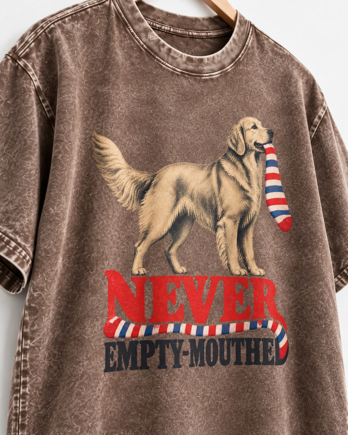 Never Empty Mouthed Golden Retriever Washed Tee in Coffee, close-up of the graphic