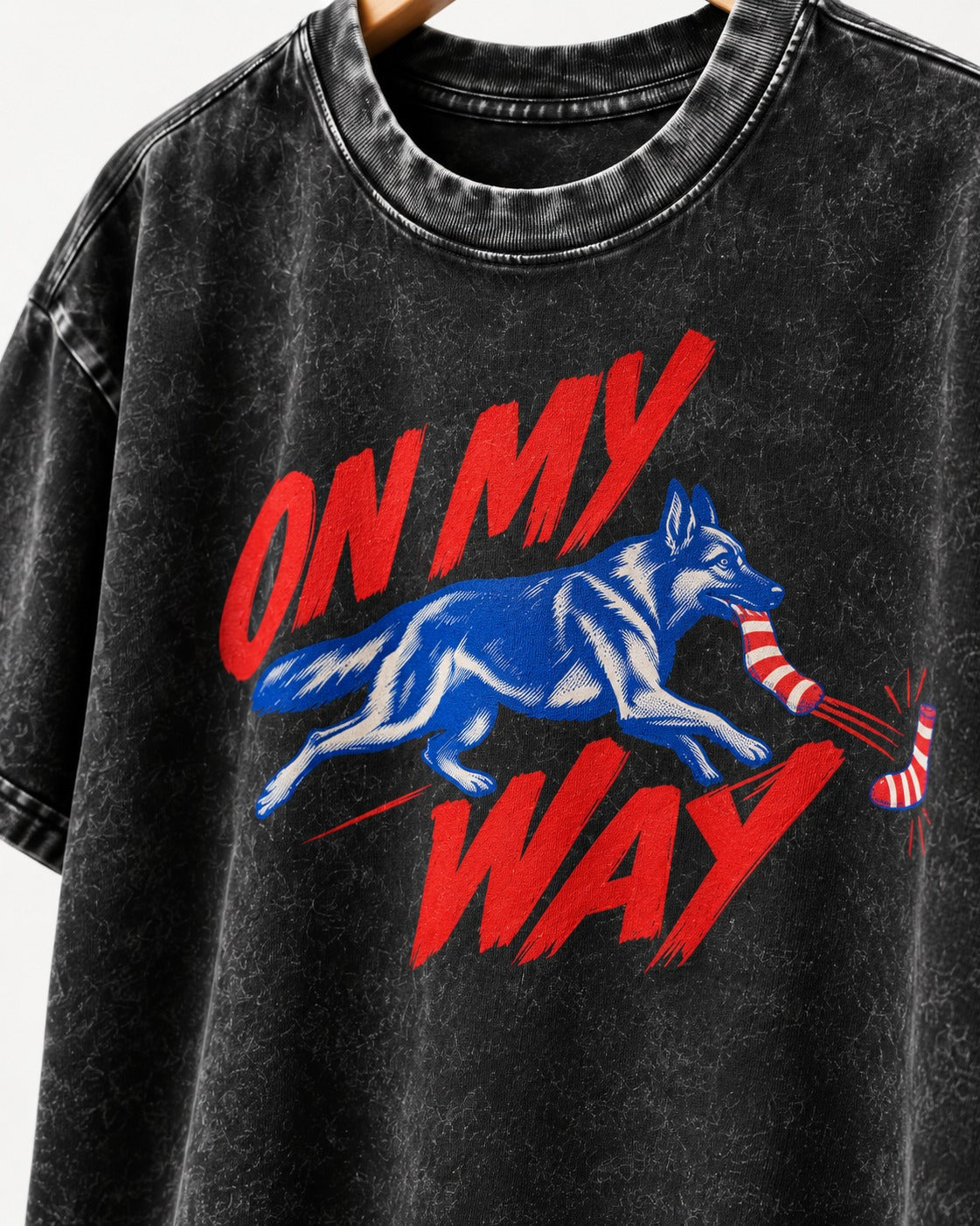 German Shepherd Dog On My Way Sock Chase Graphic Washed Tee in Black, close-up of the graphic