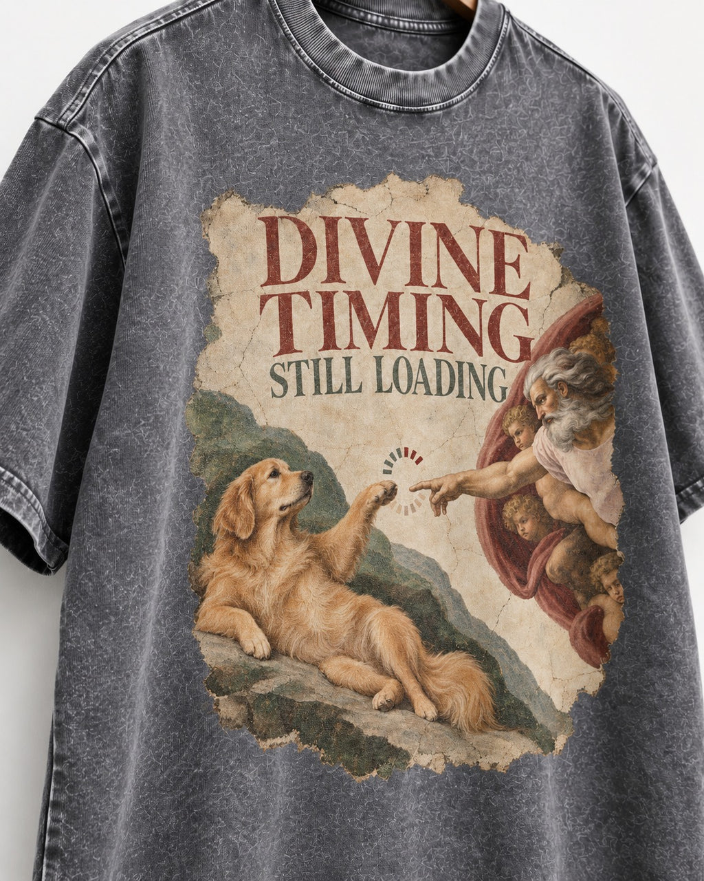 Divine Timing Still Loading Creation Scene Golden Retriever Graphic Washed Tee in Gray, close-up of the graphic