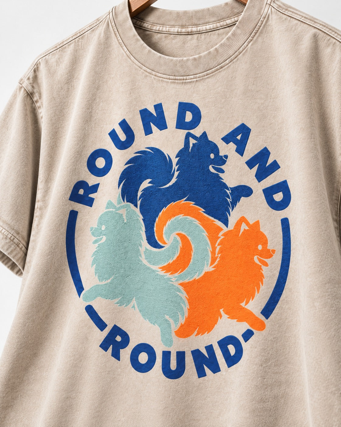 Pomeranian Round and Round Washed Tee in Apricot, close-up of the graphic