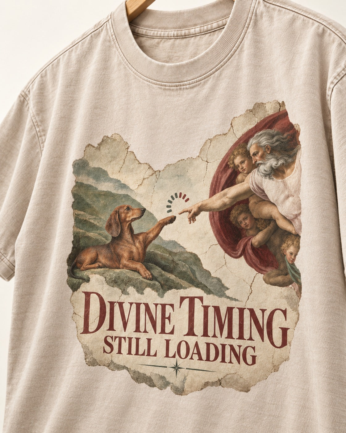 Dachshund's Divine Timing Washed Tee in Apricot, close-up of the graphic