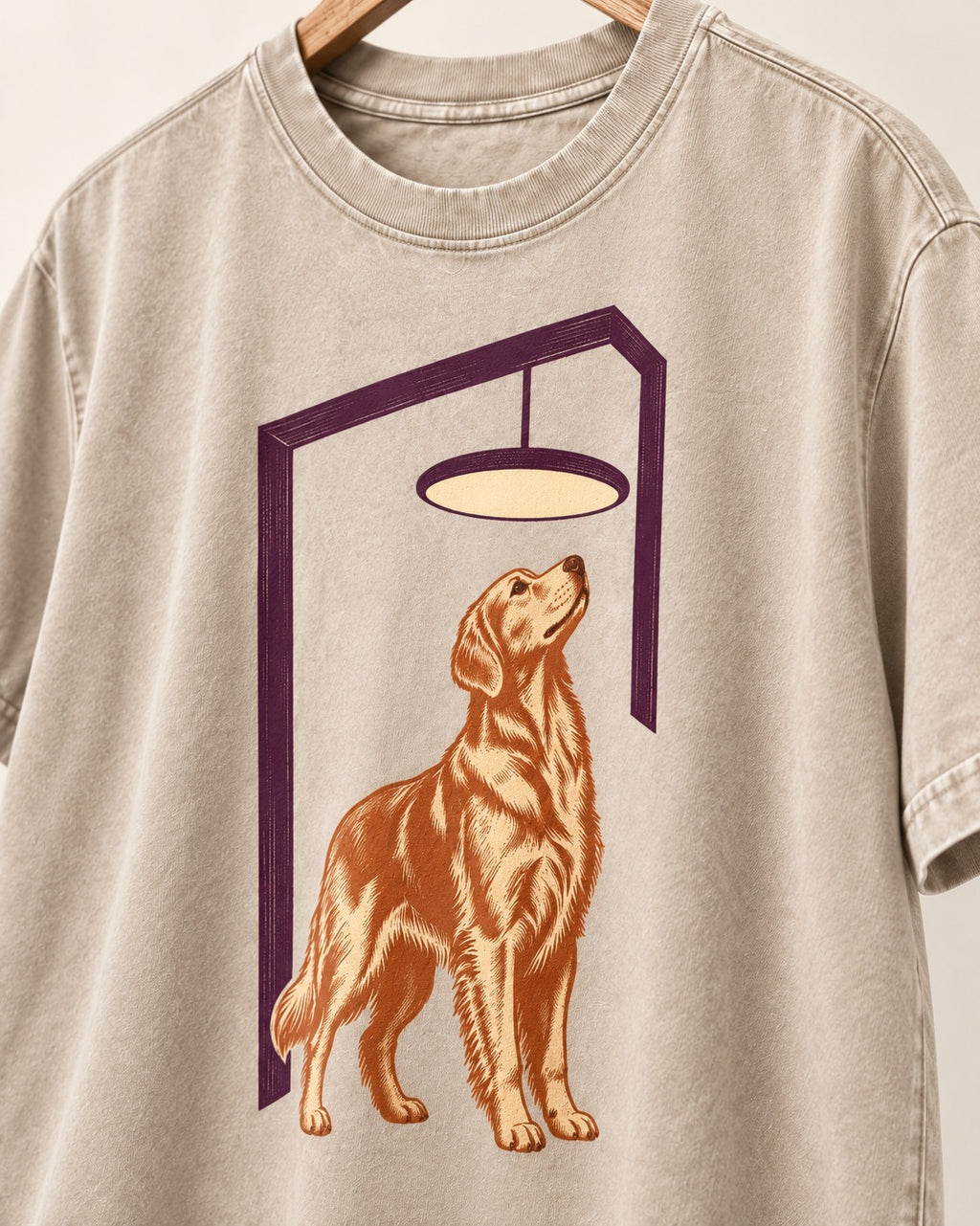 Golden Retriever Bright Idea Washed Tee in Apricot, close-up of the graphic