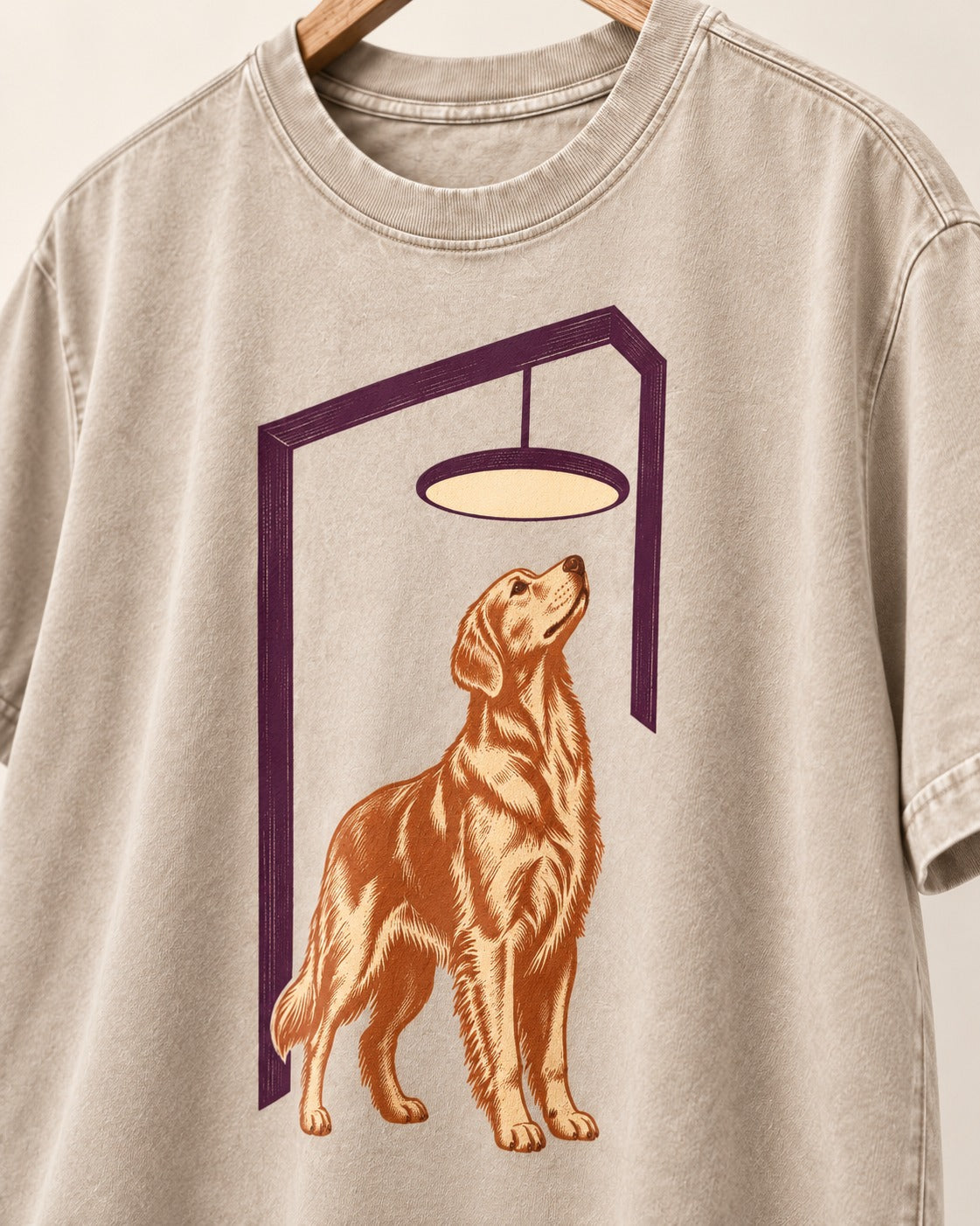 Golden Retriever Bright Idea Washed Tee in Apricot, close-up of the graphic