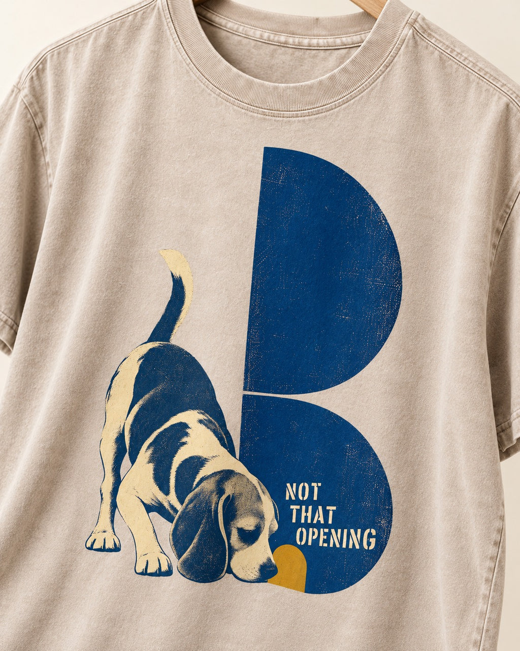 Not That Opening Beagle Washed Tee in Apricot, close-up of the graphic