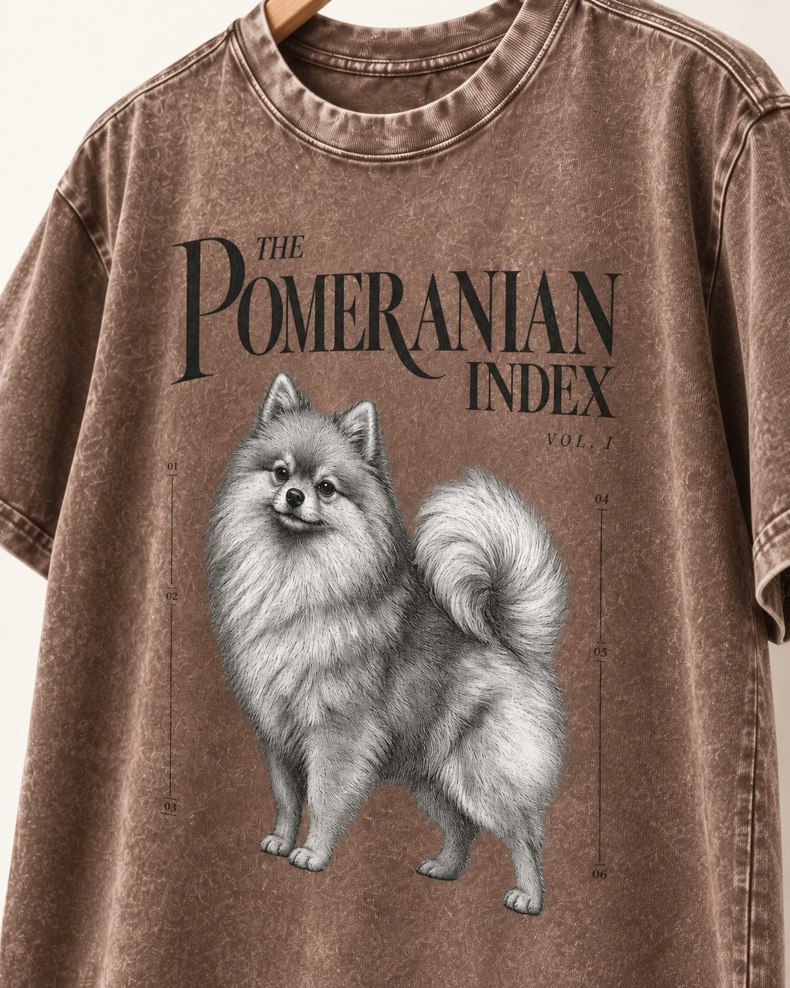 The Pomeranian Index Washed Tee in Coffee, close-up of the graphic