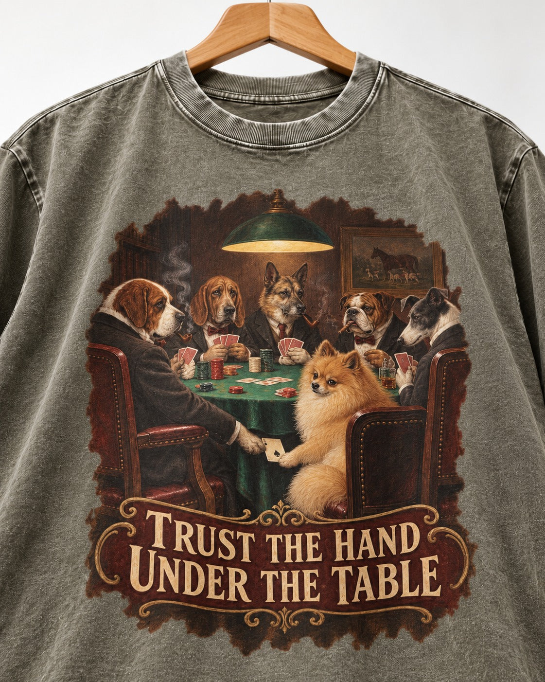 Pomeranian Trust the Hand Under the Table Poker Dogs Graphic Washed Tee in Army Green, close-up of the graphic