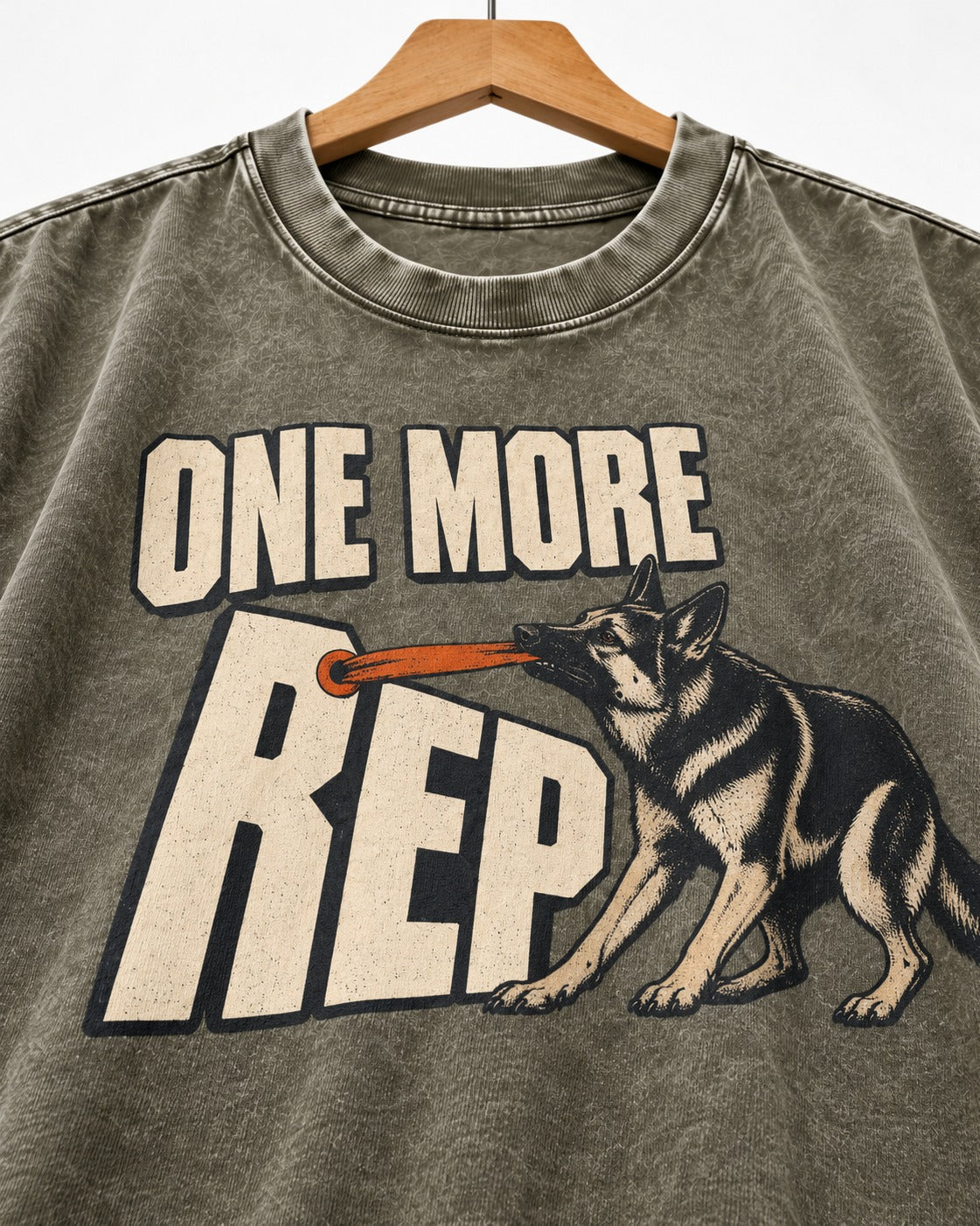One More Rep Tug German Shepherd Dog Graphic Washed Tee in Army Green, close-up of the graphic
