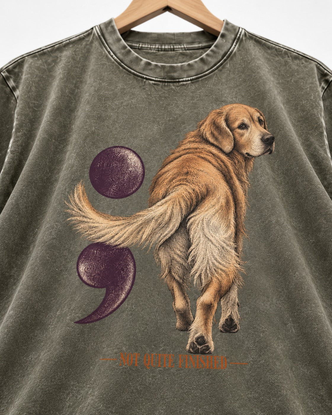Golden Retriever Not Quite Finished Semicolon Graphic Washed Tee in Army Green, close-up of the graphic