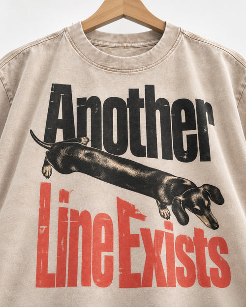 Another Dachshund Line Exists Washed Tee in Apricot, close-up of the graphic