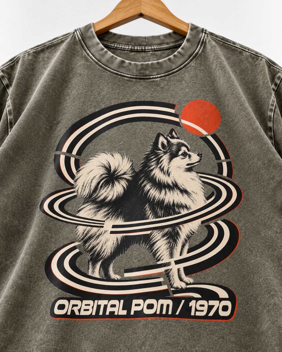 Pomeranian Orbital Pom 1970 Space Age Graphic Washed Tee in Army Green, close-up of the graphic