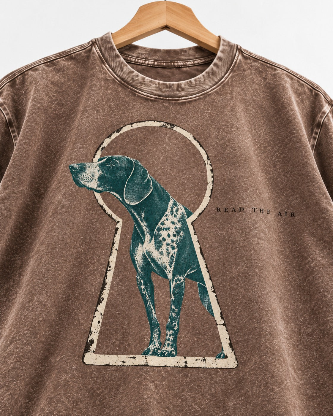 Read the Air German Shorthaired Pointer Washed Tee in Coffee, close-up of the graphic