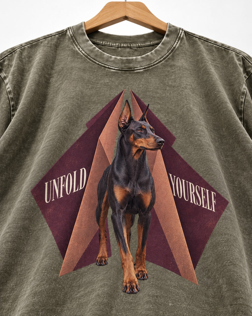 Doberman Unfold Yourself Geometric Portrait Graphic Washed Tee in Army Green, close-up of the graphic