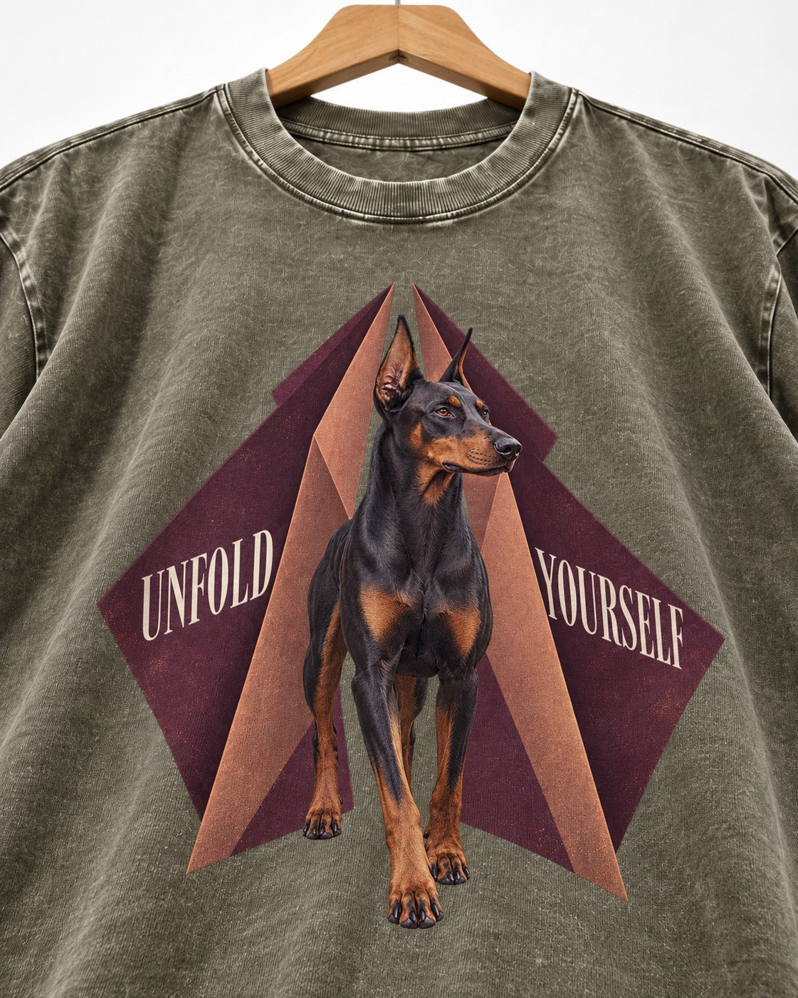 Doberman Unfold Yourself Geometric Portrait Graphic Washed Tee in Army Green, close-up of the graphic