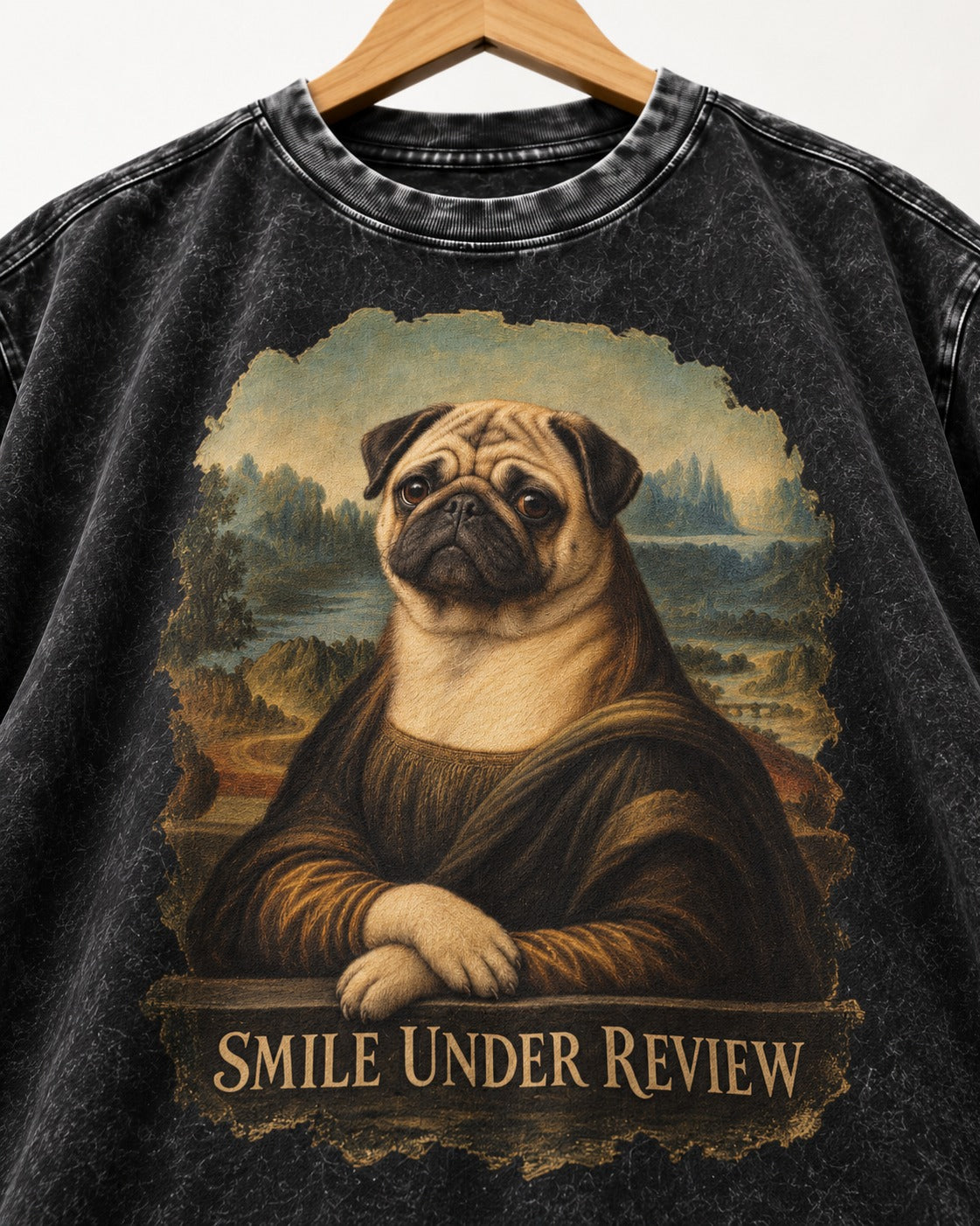 Pug Smile Under Review Mona Lisa Graphic Washed Tee in Black, close-up of the graphic