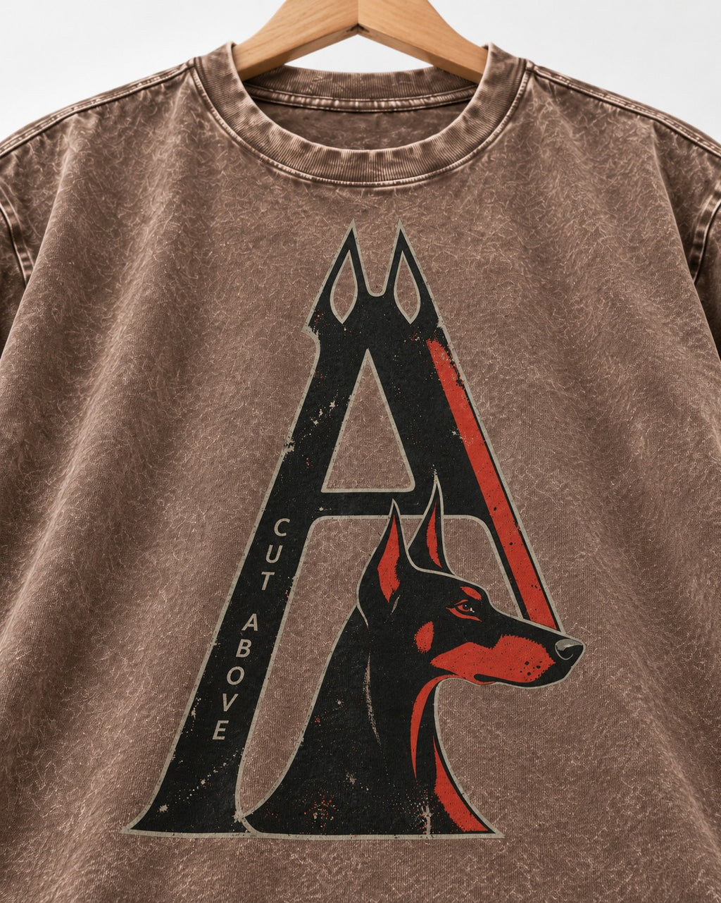 Doberman A Cut Above Washed Tee in Coffee, close-up of the graphic