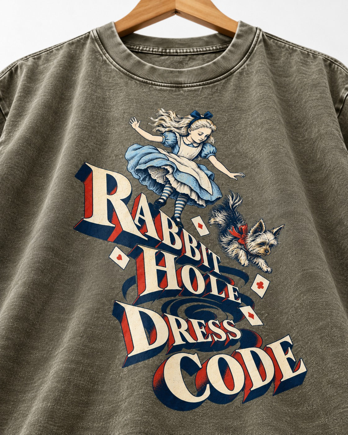 Yorkshire Terrier Rabbit Hole Dress Code Wonderland Graphic Washed Tee in Army Green, close-up of the graphic