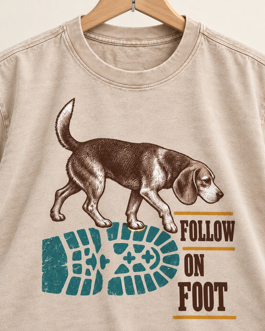 Follow the Beagle on Foot Washed Tee in Apricot, close-up of the graphic