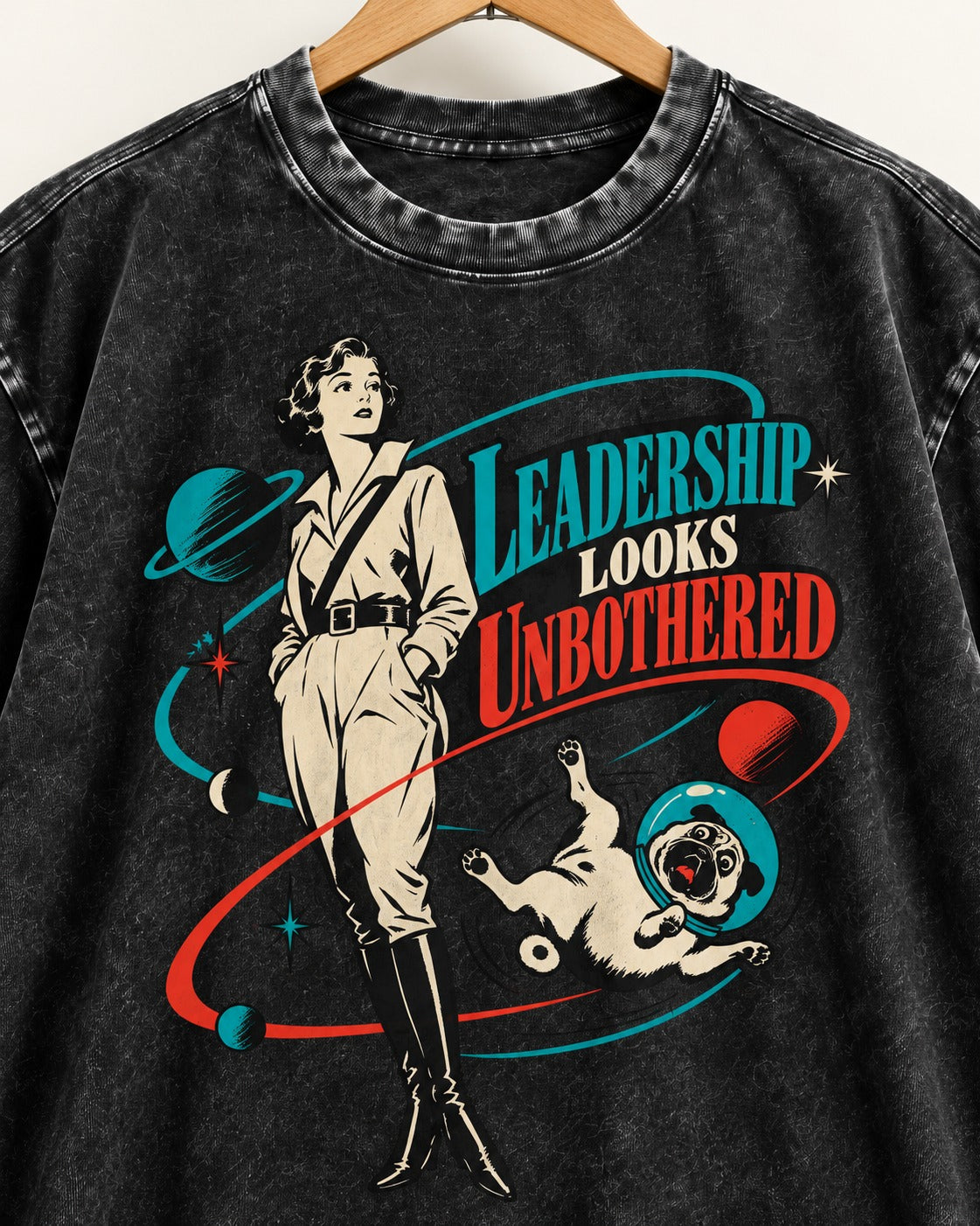 Pug Leadership Looks Unbothered Space Graphic Washed Tee in Black, close-up of the graphic