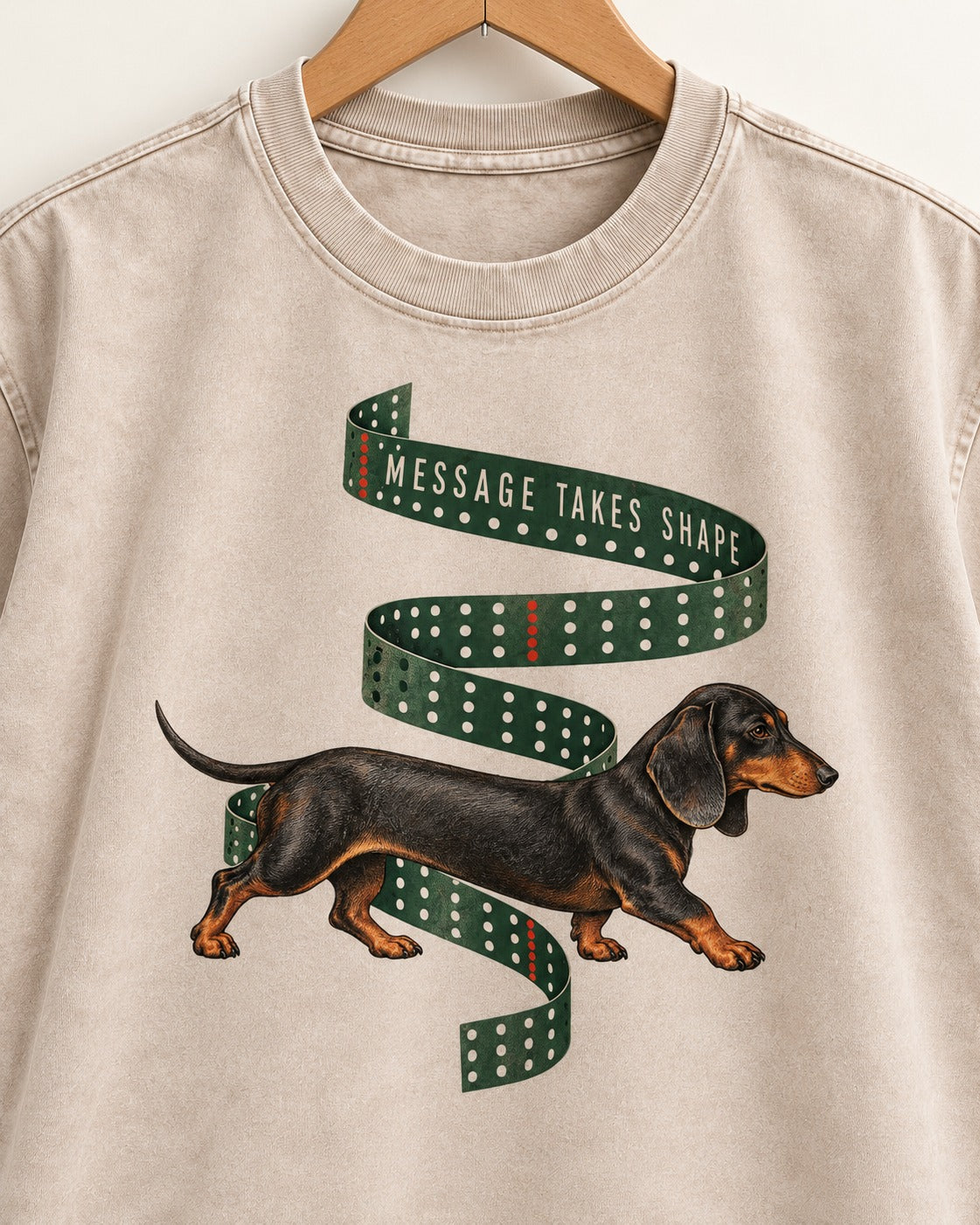 Dachshund Message Takes Shape Washed Tee in Apricot, close-up of the graphic