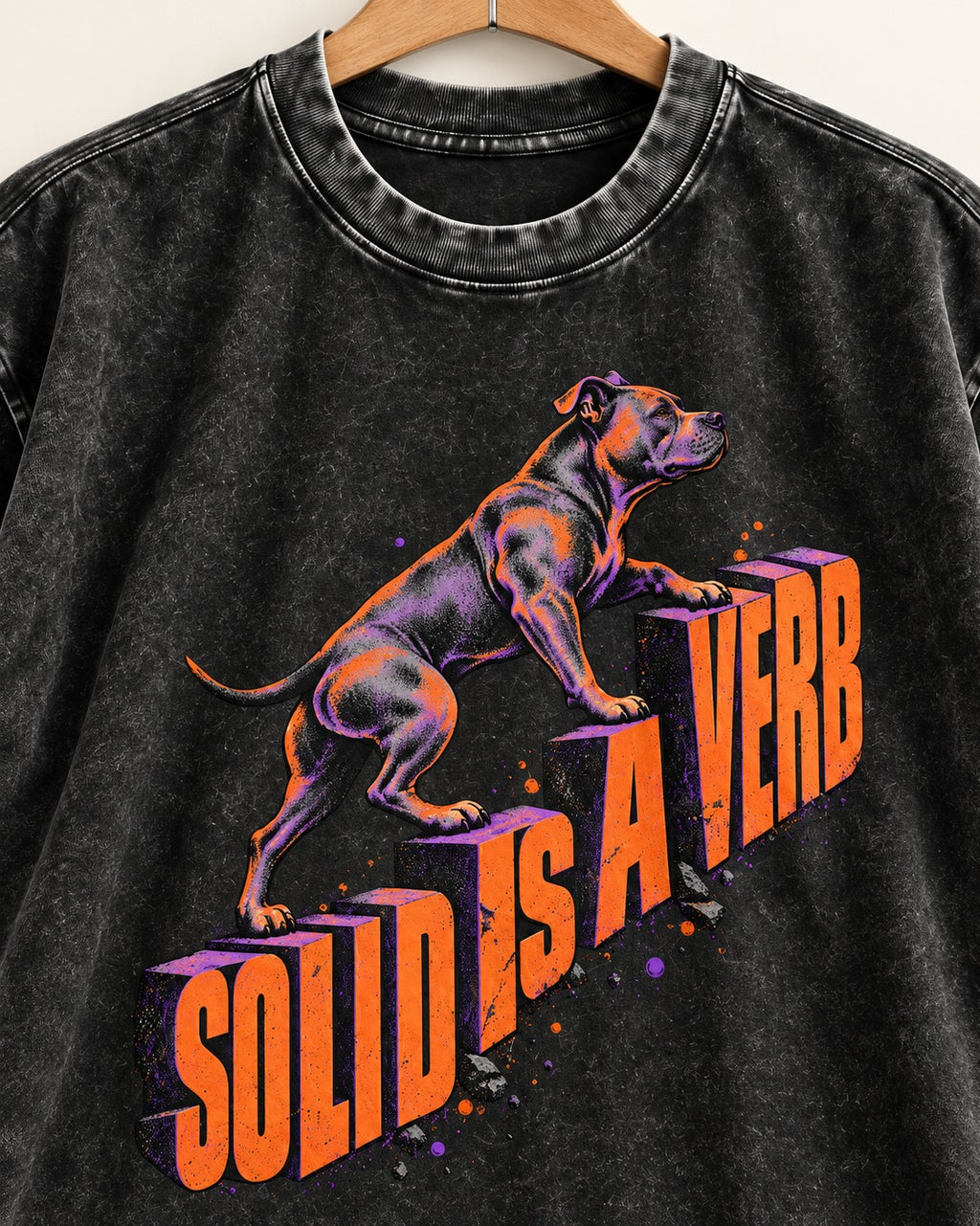 Pitbull Solid Is a Verb Step Type Graphic Washed Tee in Black, close-up of the graphic