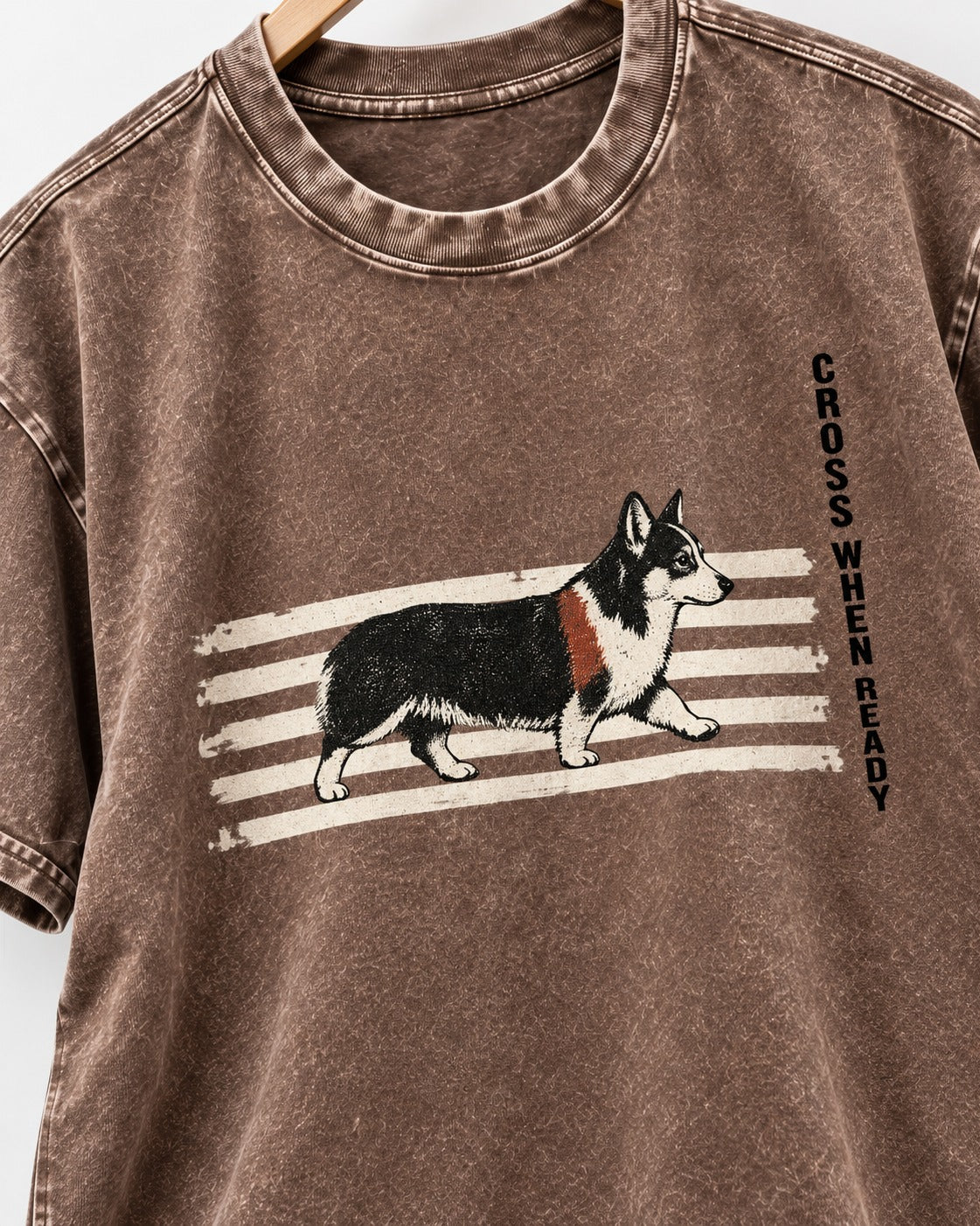 Corgi Cross When Ready Crossing Bars Graphic Washed Tee in Coffee, close-up of the graphic