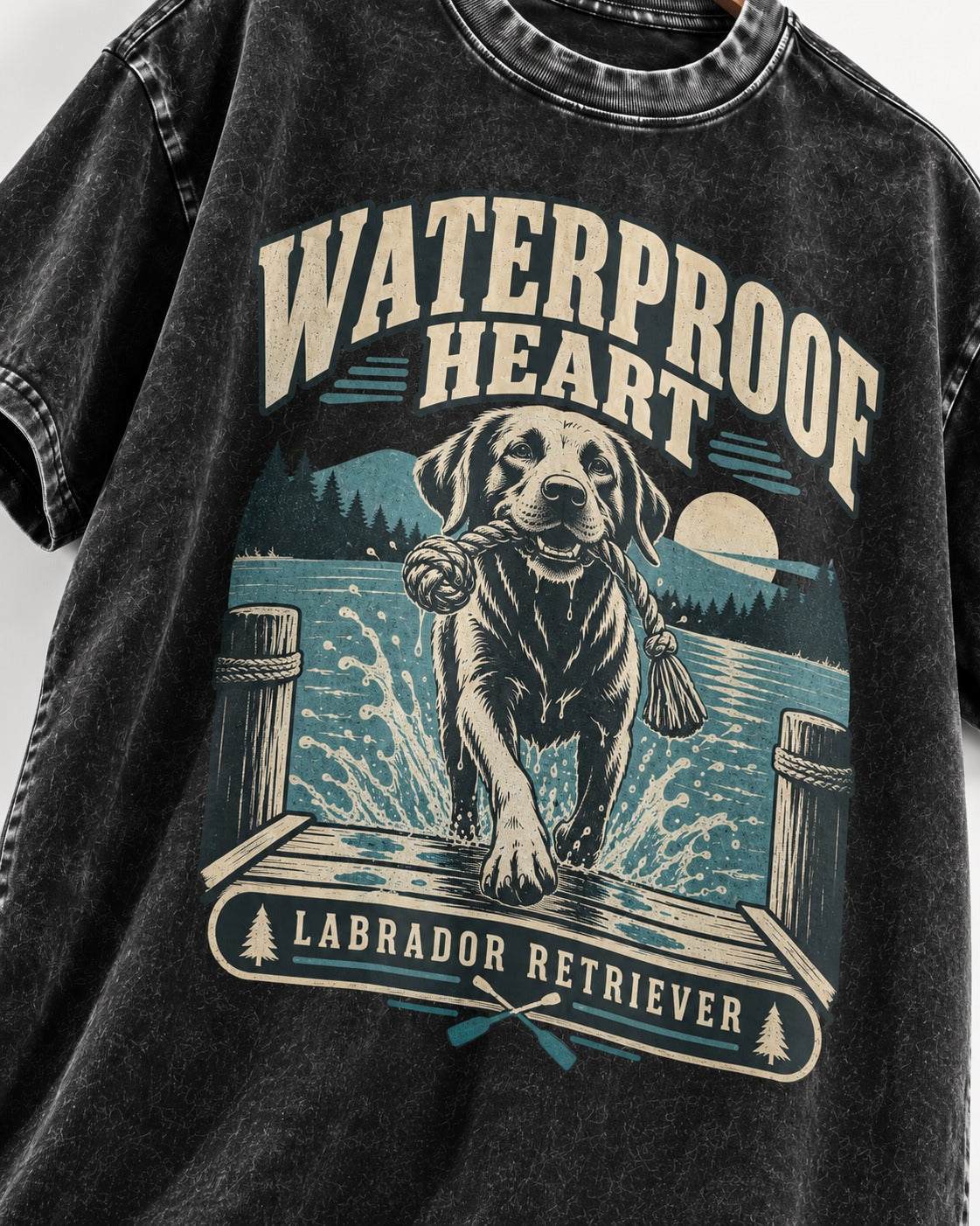 Labrador Retriever Waterproof Heart Lake Adventure Graphic Washed Tee in Black, close-up of the graphic