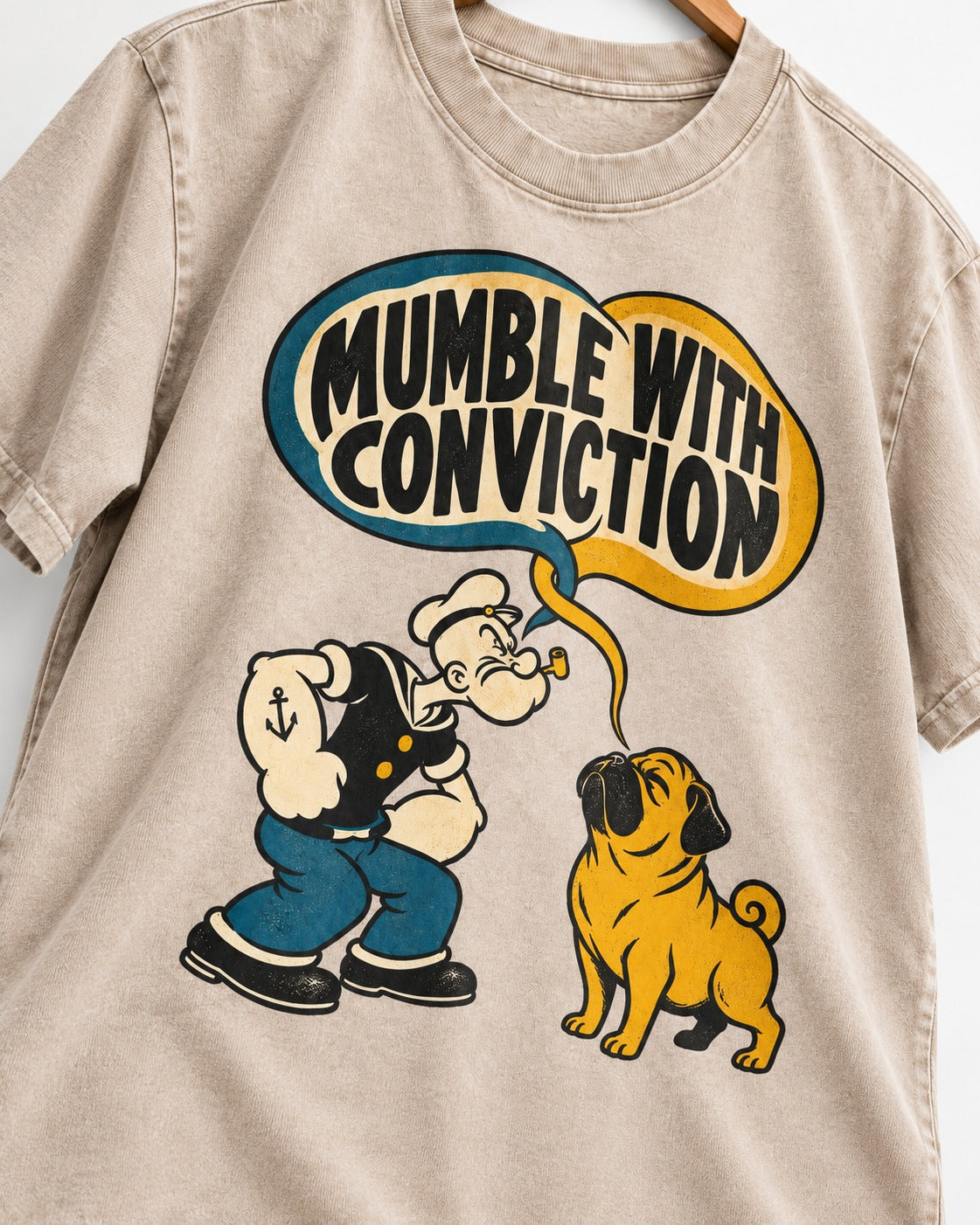 Pug Mumble with Conviction Washed Tee in Apricot, close-up of the graphic
