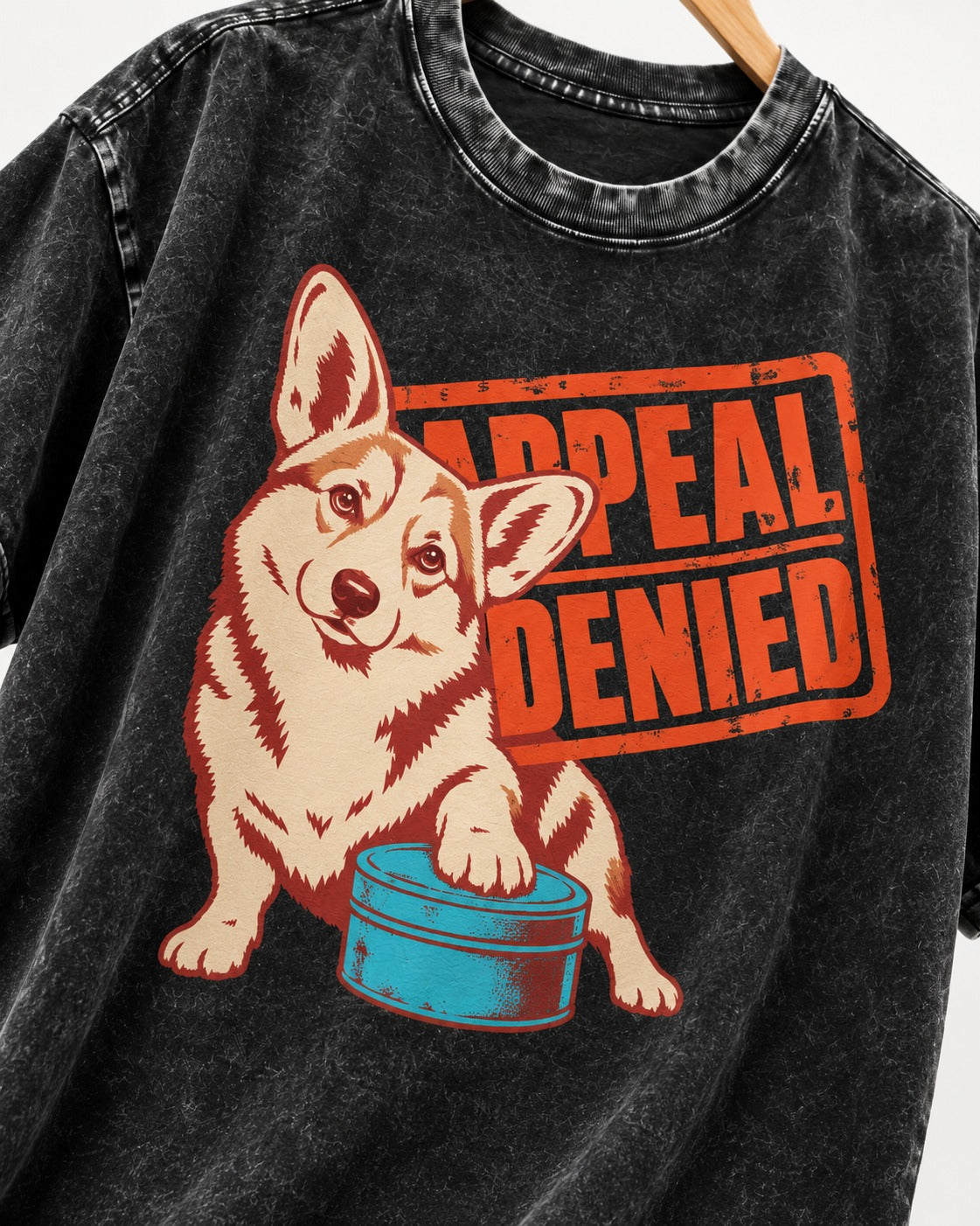 Corgi Appeal Denied Treat Tin Washed Tee in Black, close-up of the graphic