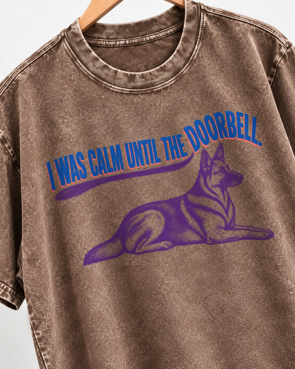 German Shepherd Dog Calm Until the Doorbell Washed Tee in Coffee, close-up of the graphic