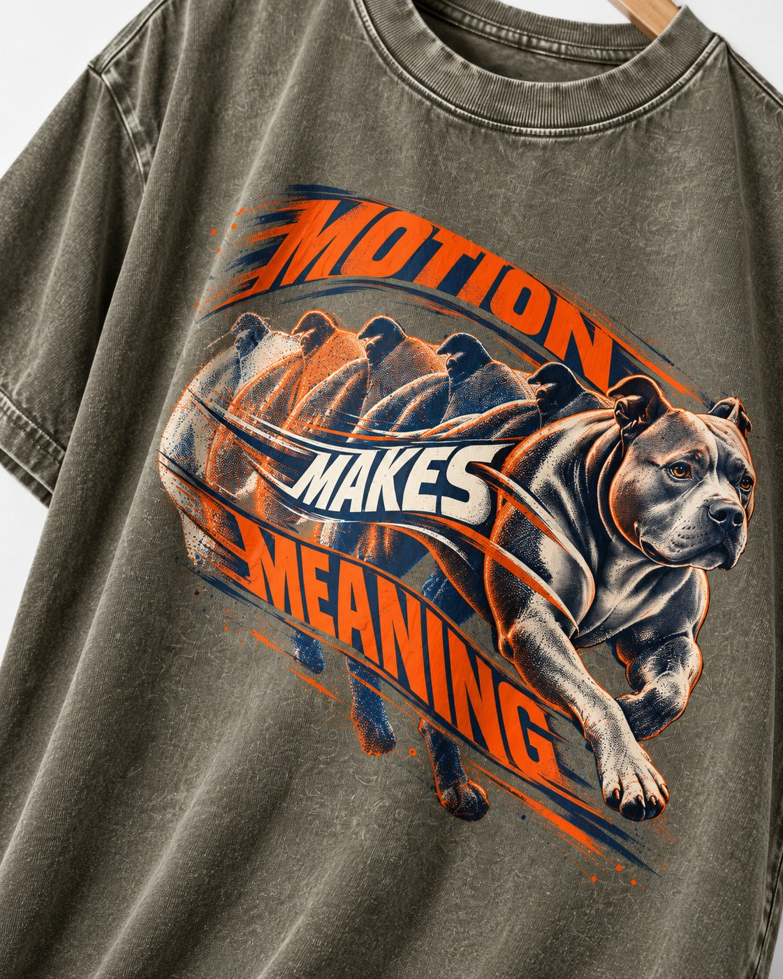 Pitbull Motion Makes Meaning Running Dog Graphic Washed Tee in Army Green, close-up of the graphic