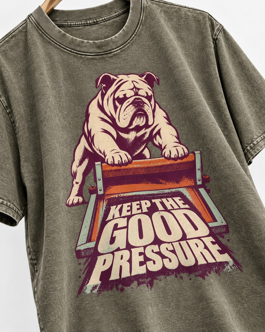 English Bulldog Keep the Good Pressure Printing Press Graphic Washed Tee in Army Green, close-up of the graphic